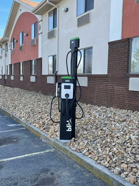 Blink EV charging station installed at a hotel parking lot
