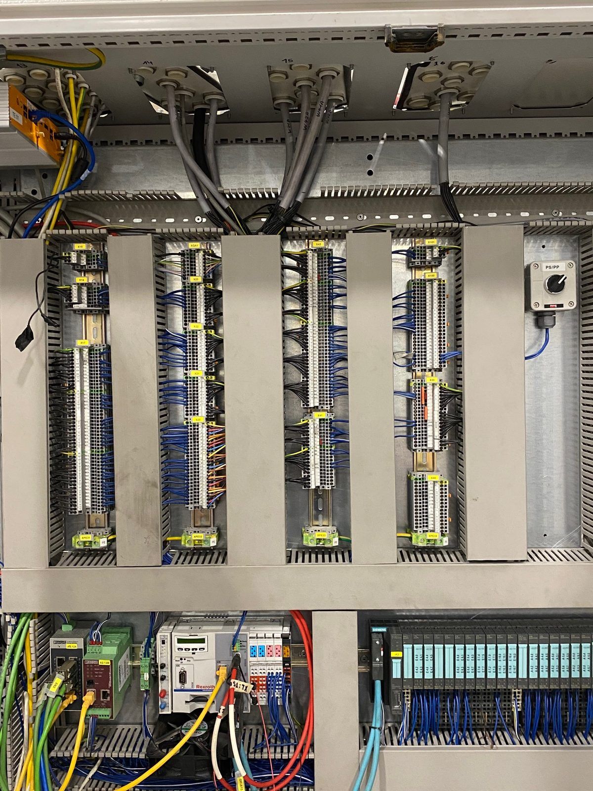 Terminal strips wired and labeled in a finished control cabinet