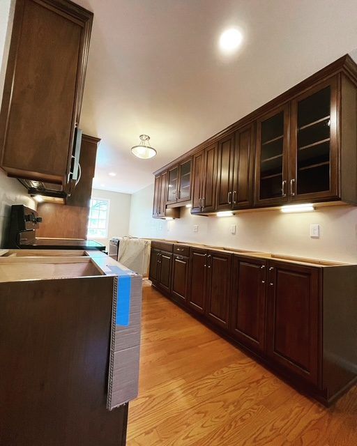 Kitchen with new under-cabinet lighting and recessed ceiling lights