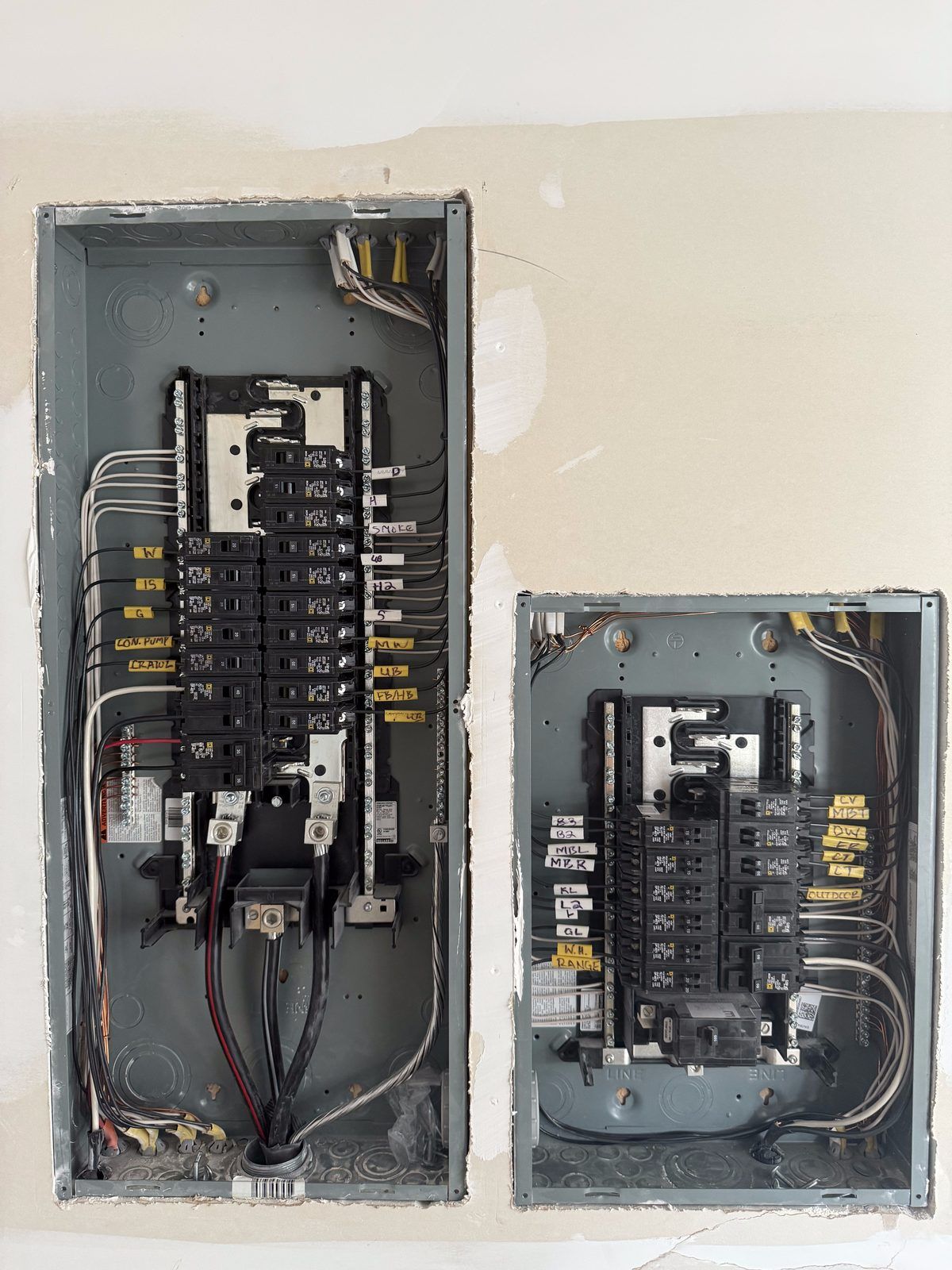 Main panel and subpanel side by side with every circuit labeled